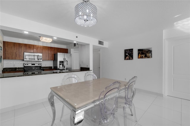 view of tiled dining space