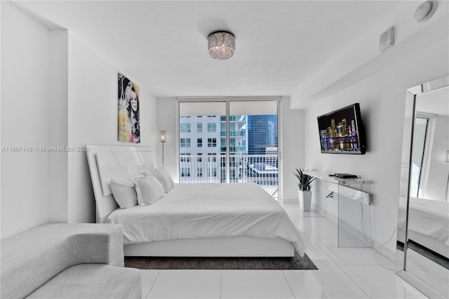 bedroom with access to outside, tile patterned flooring, and floor to ceiling windows