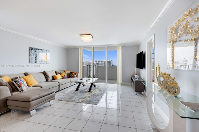 living room with light tile patterned floors, plenty of natural light, and ornamental molding