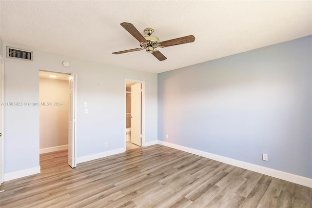 9460 Sunrise Lakes Blvd Unit 309, Sunrise, FL 33322 - unfurnished bedroom featuring light wood-style flooring, baseboards, ceiling fan, and connected bathroom