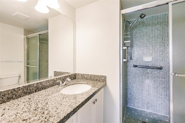 9460 Sunrise Lakes Blvd Unit 309, Sunrise, FL 33322 - bathroom featuring a stall shower and vanity