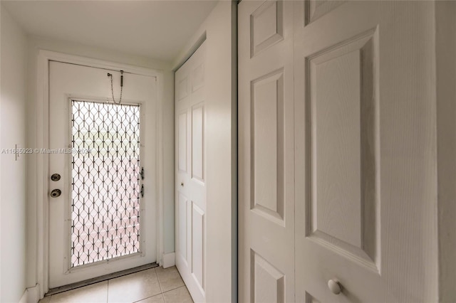 9460 Sunrise Lakes Blvd Unit 309, Sunrise, FL 33322 - doorway to outside with light tile patterned floors and plenty of natural light
