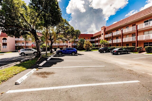 9460 Sunrise Lakes Blvd Unit 309, Sunrise, FL 33322 - view of uncovered parking lot