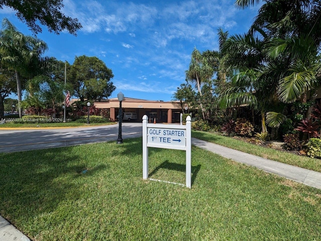 9460 Sunrise Lakes Blvd Unit 309, Sunrise, FL 33322 - community / neighborhood sign with concrete driveway and a yard