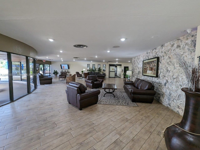 living room with light hardwood / wood-style floors