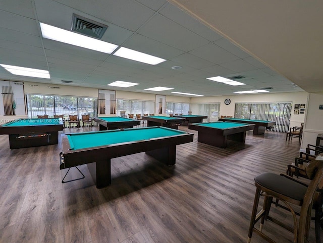 playroom featuring a drop ceiling, pool table, and dark wood-type flooring