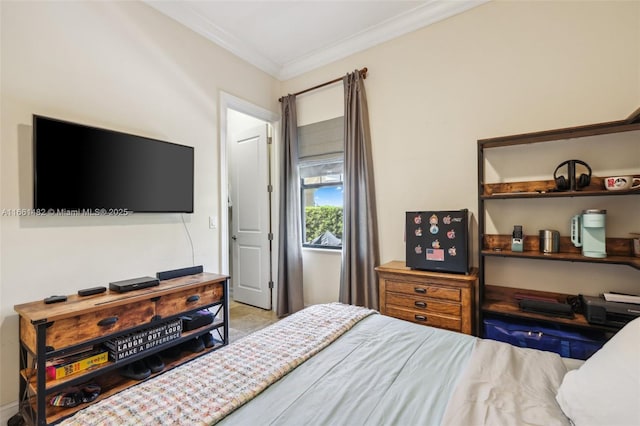 bedroom with ornamental molding