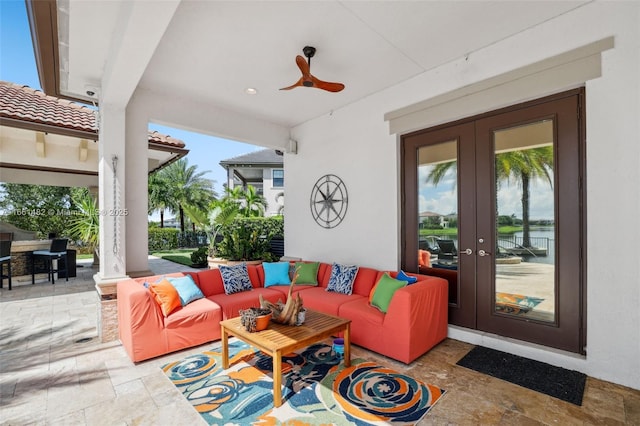 view of patio with an outdoor living space and french doors