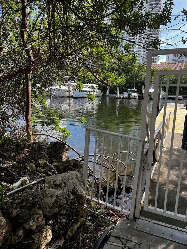 view of dock with a water view