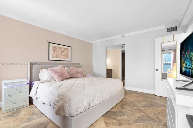 bedroom featuring crown molding