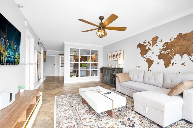 living room with ceiling fan and crown molding