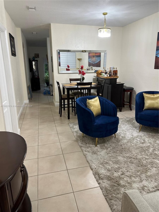 living room with light tile patterned flooring