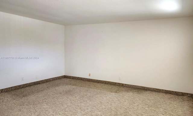 spare room with carpet flooring