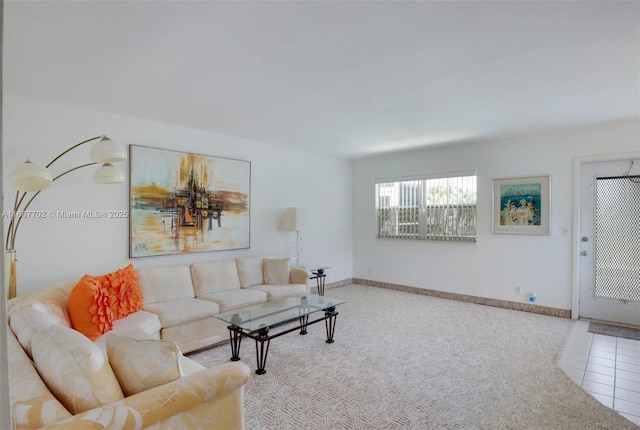 living room with tile patterned floors