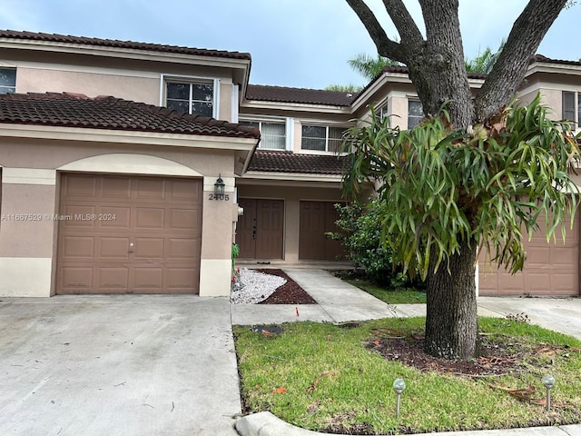 view of front of home with a garage