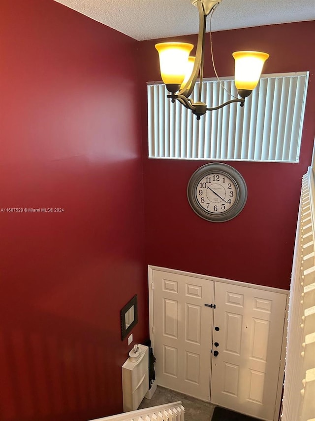 interior space featuring a textured ceiling