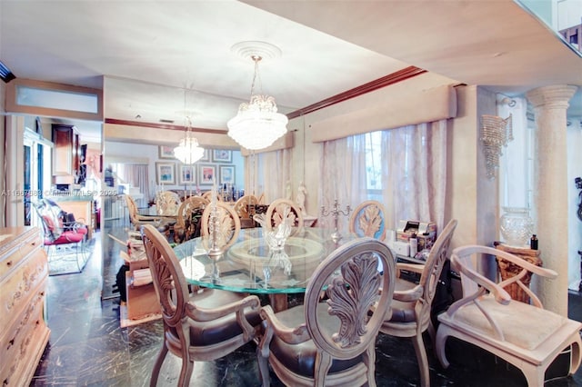 dining area featuring a notable chandelier, marble finish floor, decorative columns, and crown molding