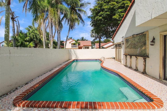 view of pool with a fenced in pool and a fenced backyard