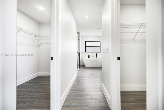 hallway featuring dark hardwood / wood-style floors