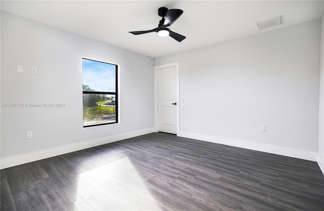 spare room featuring hardwood / wood-style flooring and ceiling fan