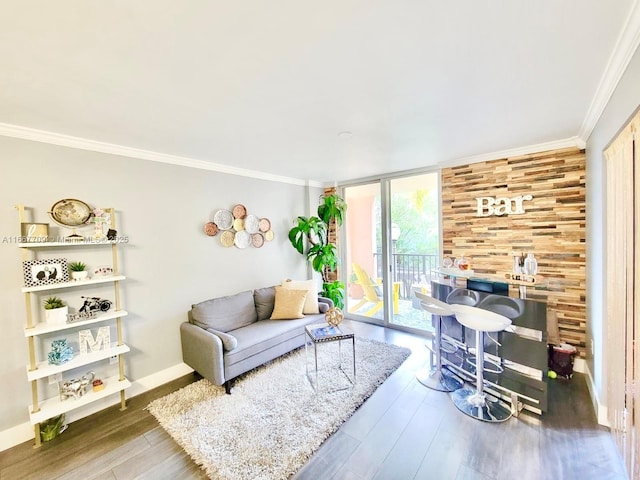 living room with dark hardwood / wood-style flooring, expansive windows, and ornamental molding