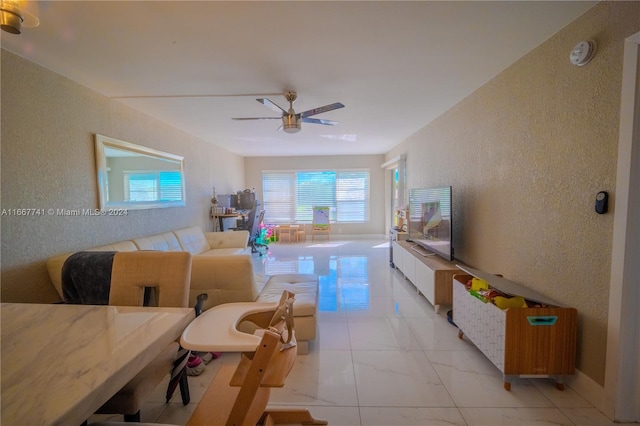 living room with ceiling fan