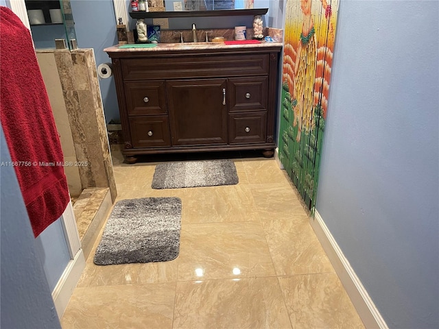 bathroom featuring vanity and walk in shower