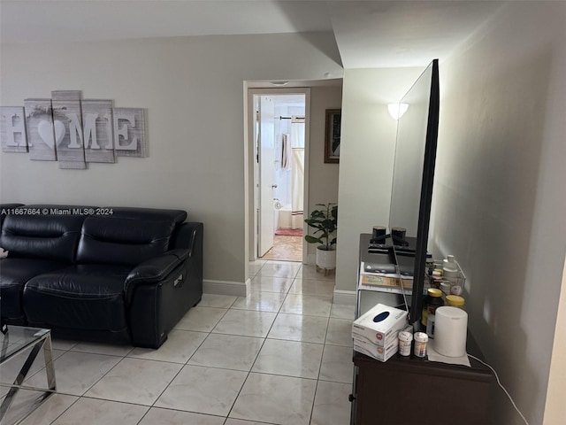 living room featuring light tile patterned flooring