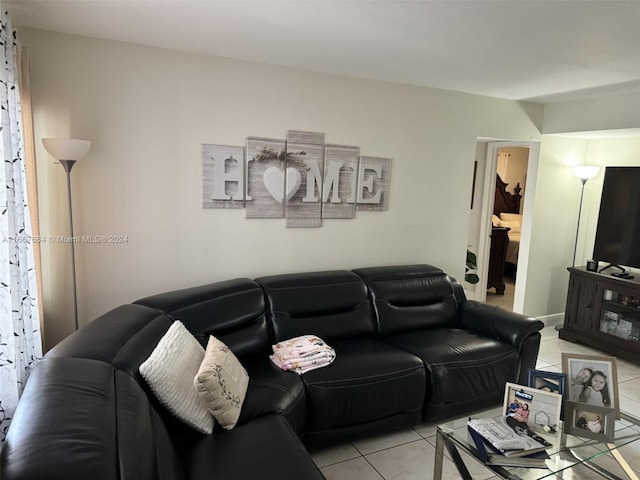 living room with light tile patterned floors