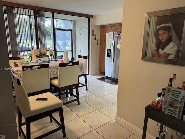 dining room with light tile patterned floors