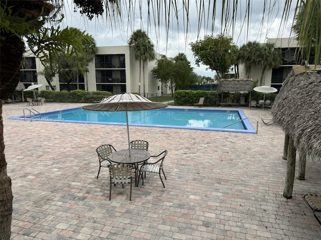 view of pool with a patio