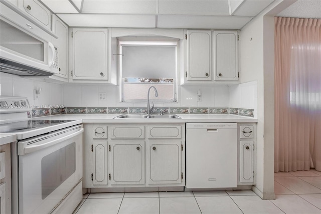 5300 Washington St Unit C111, Hollywood, FL 33021 - kitchen featuring white appliances, light countertops, and light tile patterned floors