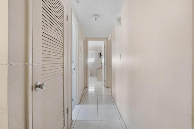 5300 Washington St Unit C111, Hollywood, FL 33021 - corridor with light tile patterned flooring and baseboards