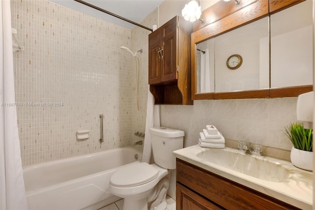 full bathroom featuring shower / bath combo with shower curtain, vanity, and toilet