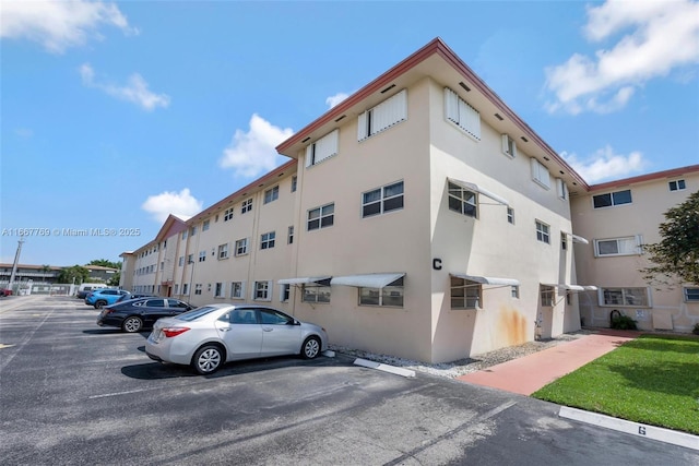 5300 Washington St Unit C111, Hollywood, FL 33021 - view of building exterior featuring uncovered parking