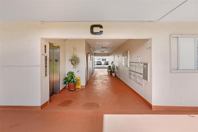 5300 Washington St Unit C111, Hollywood, FL 33021 - corridor with elevator and baseboards