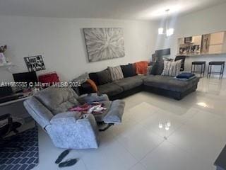 living room with tile patterned floors