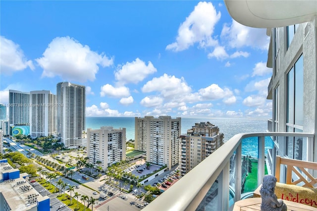 balcony featuring a water view