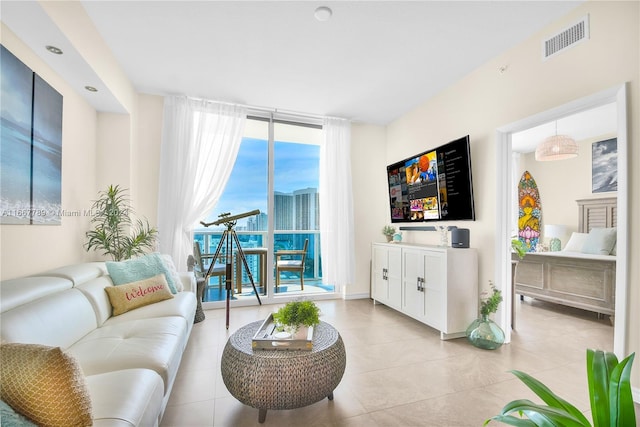 living room featuring light tile patterned floors