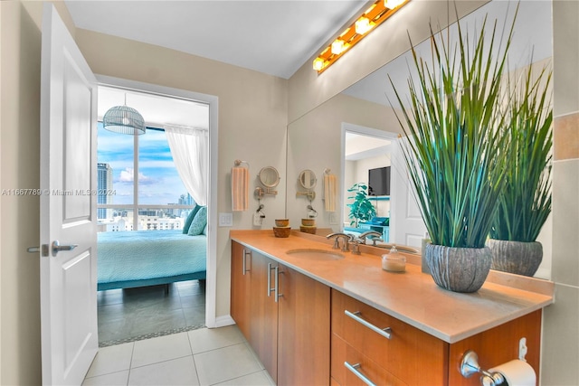 bathroom with tile patterned flooring and vanity