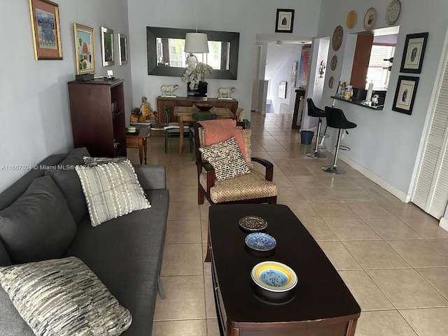 living room featuring light tile patterned flooring