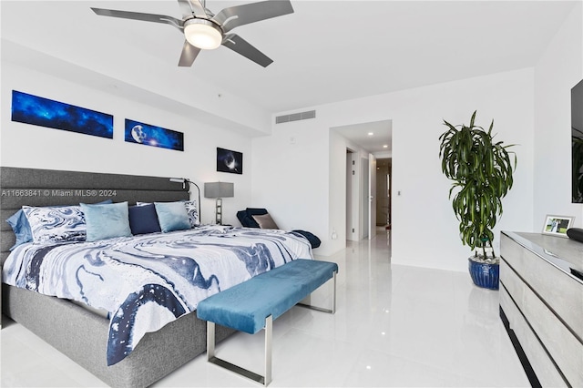 bedroom featuring light tile patterned floors and ceiling fan