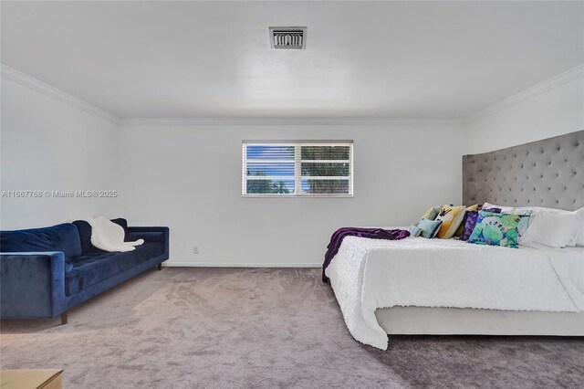 carpeted bedroom with ornamental molding