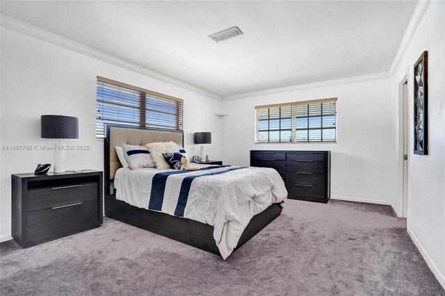 carpeted bedroom with crown molding