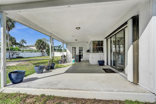 view of patio featuring french doors