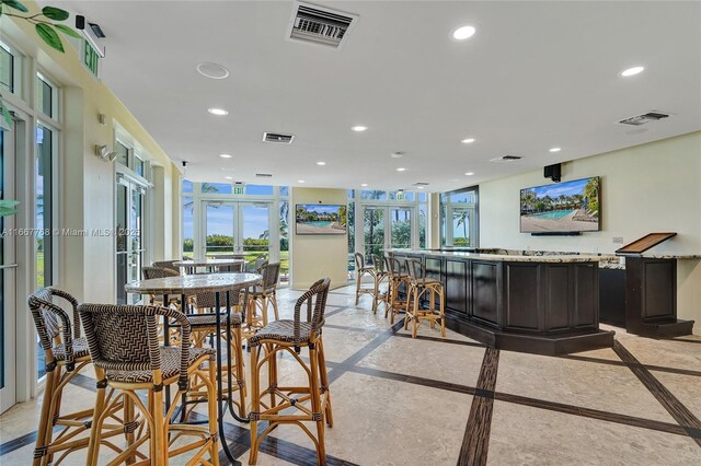 dining space featuring french doors