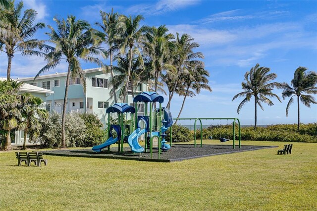 view of playground featuring a lawn