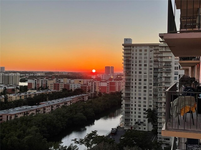 property's view of city featuring a water view