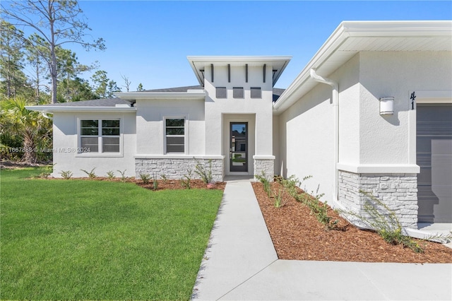 2101 NW 24th Pl, Cape Coral, FL 33993 - view of front facade featuring a front lawn, stucco siding, and stone siding
