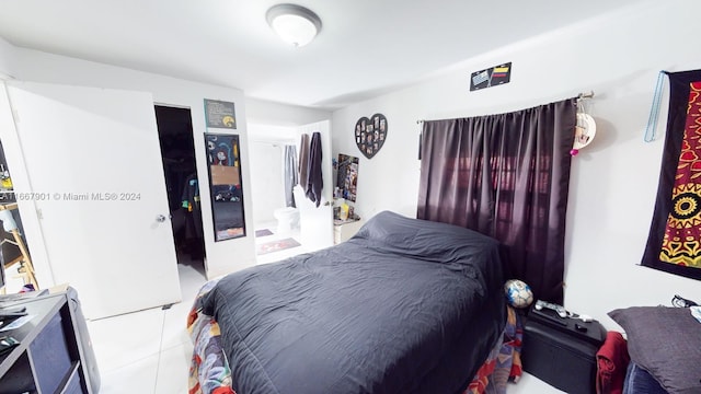 bedroom with tile patterned flooring